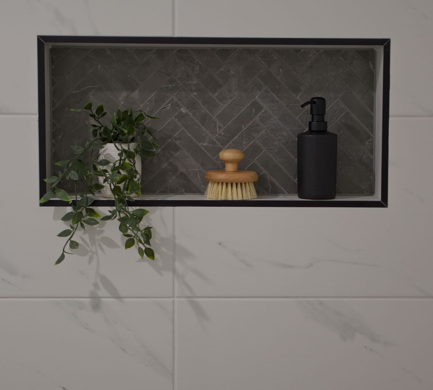 Large tiled shower niche by RB Thomas