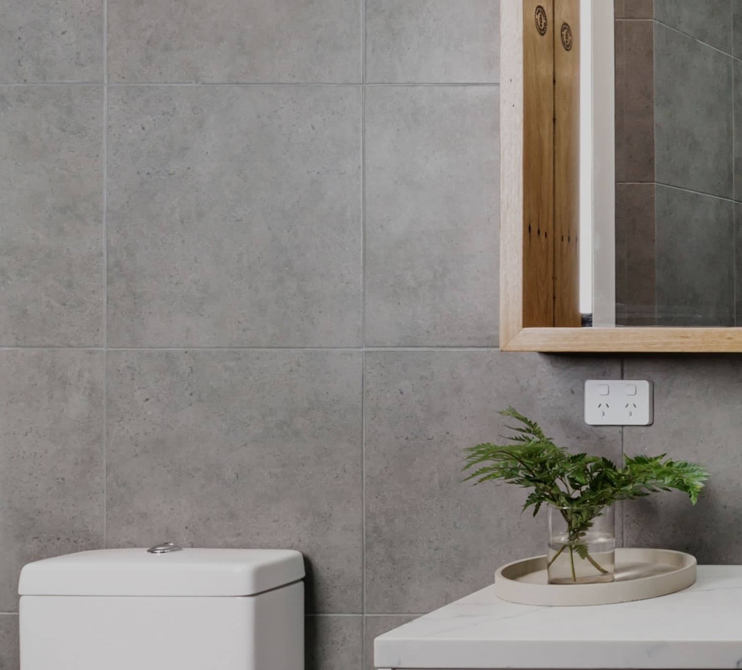 Bathroom with large-format tiles by RB Thomas
