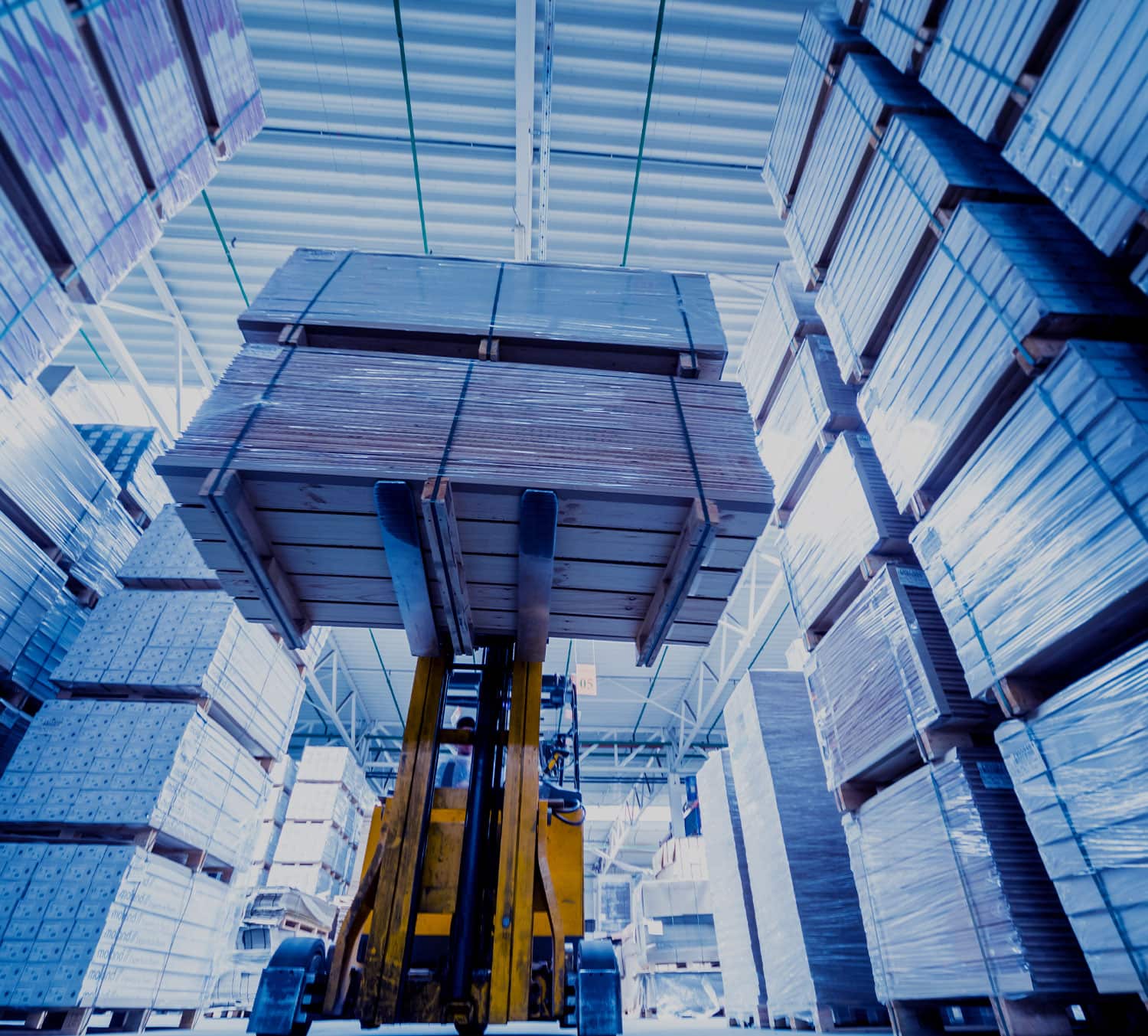 Warehouse interior with stacked pallets