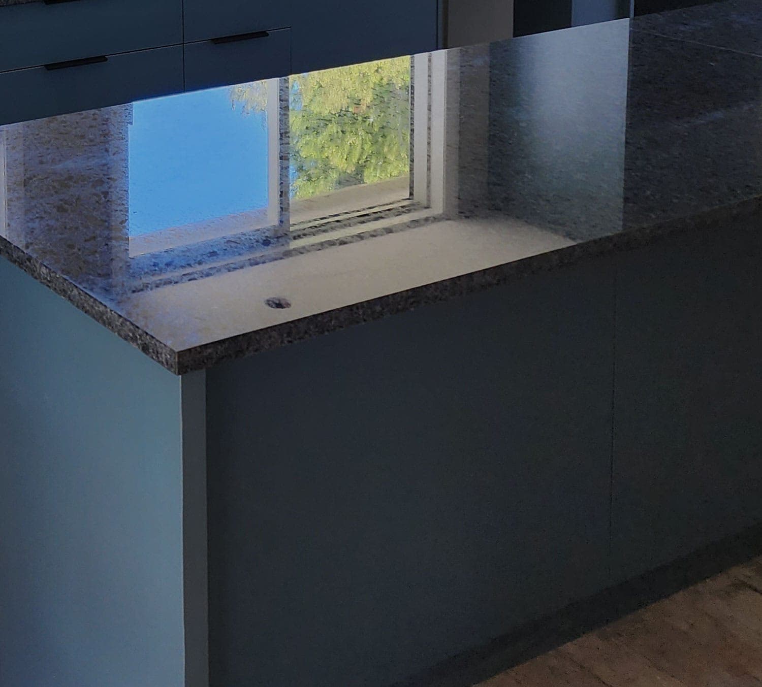 Kitchen with porcelain benchtops by RB Thomas