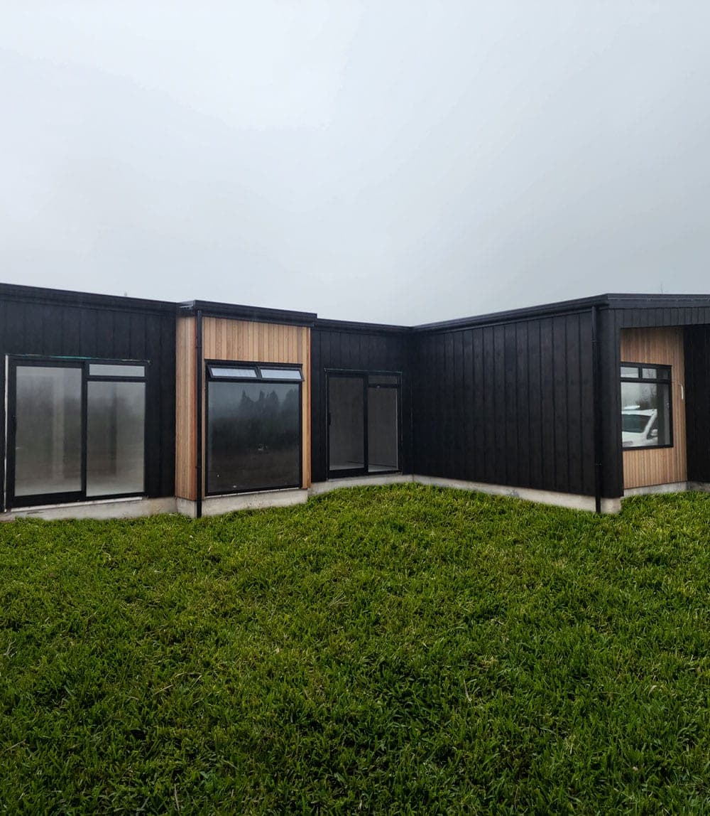 Modern black-clad new home build by RB Thomas in the Waikato