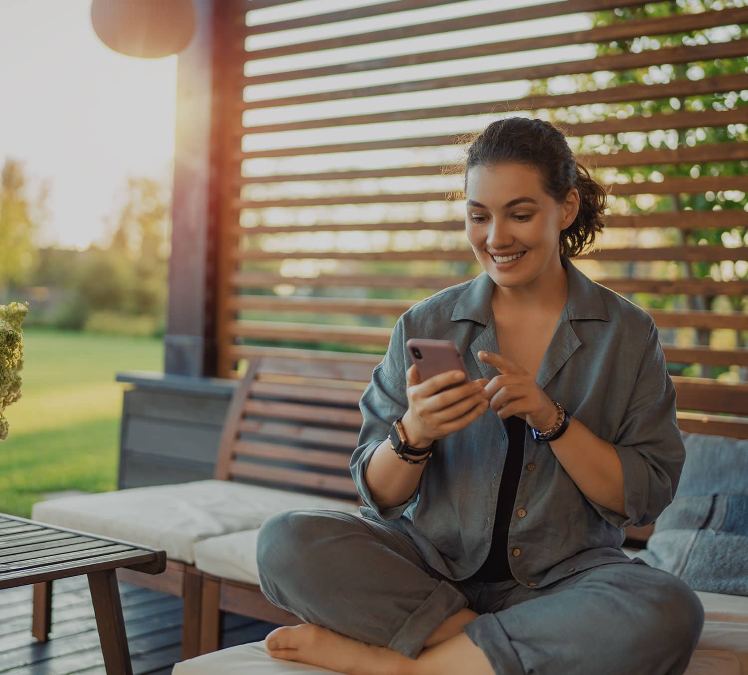 Relaxing on an outdoor deck at sunset