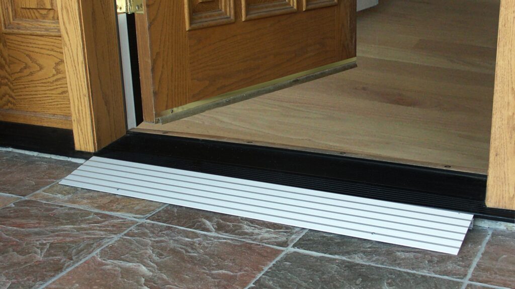 Threshold ramp at a doorway for step-free, wheelchair-friendly access