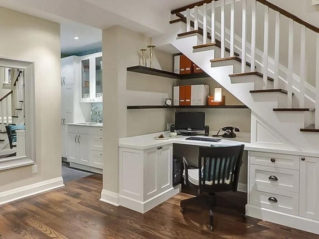 Compact study nook built in under the stairs